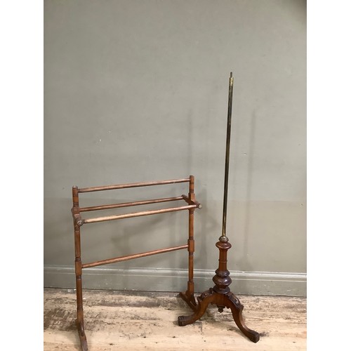 76 - A Victorian mahogany pole screen stand with carved legs together with a towel rail