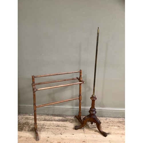 76 - A Victorian mahogany pole screen stand with carved legs together with a towel rail