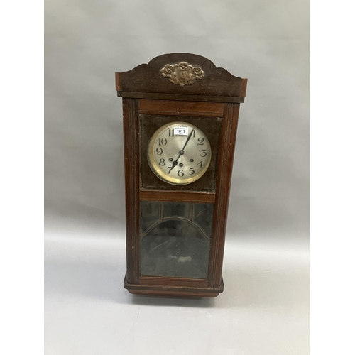 153 - An early 20th Century German wall chime clock in mahogany case, three train pendulum movement, circu... 