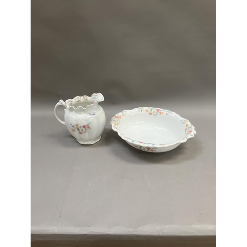 171 - A Toff toilet jug and bowl with painted flowers