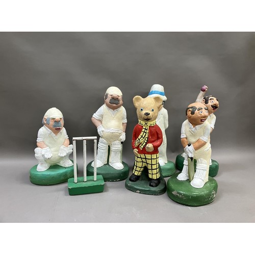 79 - A collection of composite cricketing figures together with a wicket and Rupert the Bear