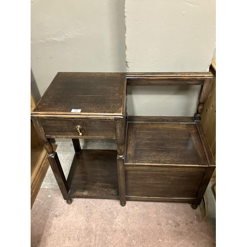 103 - An oak telephone table with single drawer, and hinged seat