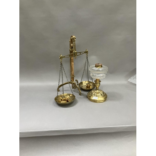 192 - A set of brass bankers scales by J.Hale and Co. with weights together with a brass oil lamp base wit... 