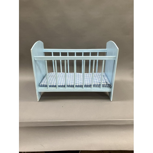 73 - A duck egg blue baby's cot painted with flowers