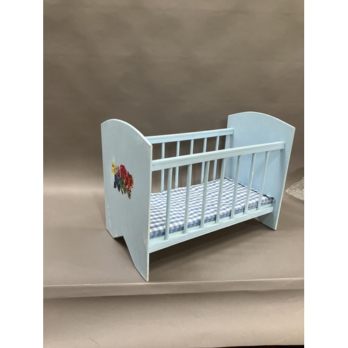 73 - A duck egg blue baby's cot painted with flowers