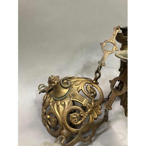 203 - A 19th century gilt metal ceiling light, with ornate pierced frame having six mounts, some missing, ... 