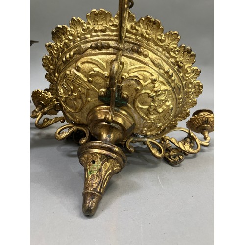 203 - A 19th century gilt metal ceiling light, with ornate pierced frame having six mounts, some missing, ... 