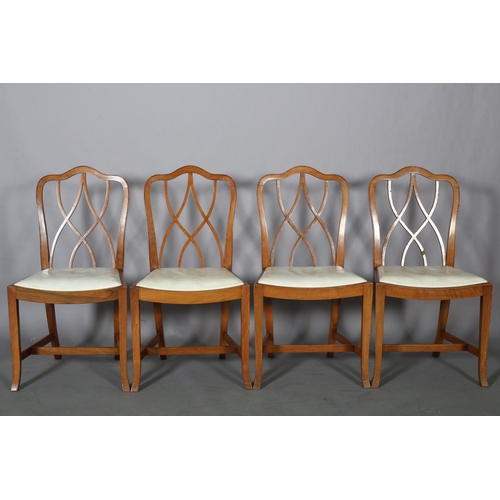 106 - Heals of London, A set of four walnut dining chairs, arched top rail over interlaced back, off-white... 