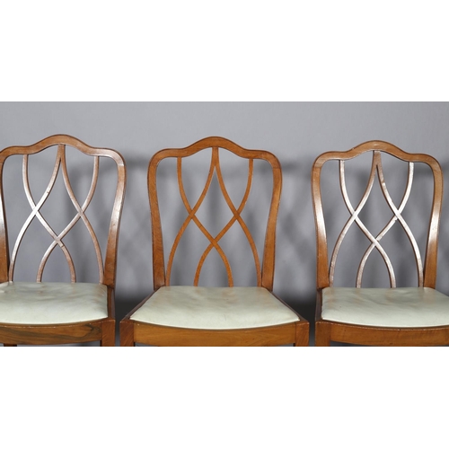 106 - Heals of London, A set of four walnut dining chairs, arched top rail over interlaced back, off-white... 