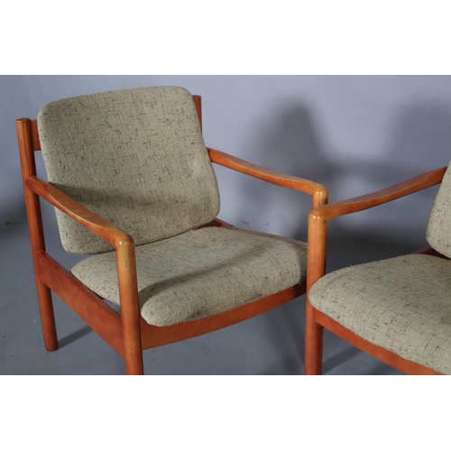 45 - A pair of Ercol '773' armchairs, c1990, upholstered in oatmeal cloth, on rounded legs