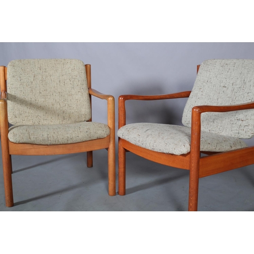 46 - A pair of Ercol '773' armchairs, c1990, upholstered in oatmeal cloth, on rounded legs