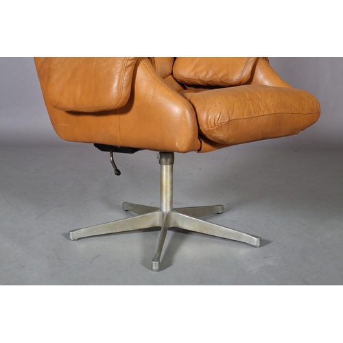 28 - A tan leather upholstered swivel chair, on five spoke base, c1960/70s