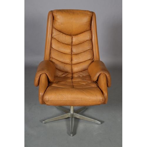 28 - A tan leather upholstered swivel chair, on five spoke base, c1960/70s