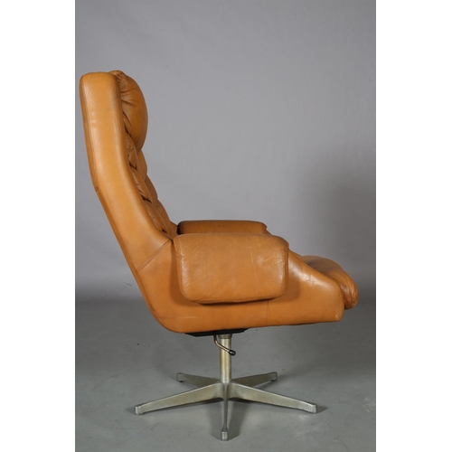 28 - A tan leather upholstered swivel chair, on five spoke base, c1960/70s