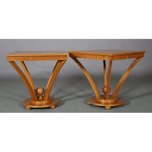 95 - R Griffith Woodwear Ltd, Wychwood Design, a pair of walnut lamp tables, of square outline, quarter v... 