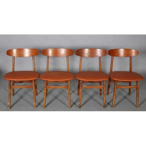 75 - A set of four Danish teak dining chairs, c1960s, in the style of Hans Wegner, having a curved bar to... 