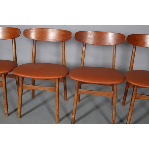 75 - A set of four Danish teak dining chairs, c1960s, in the style of Hans Wegner, having a curved bar to... 