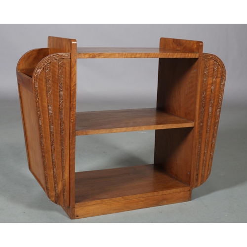 108 - An Art Deco satin walnut and walnut open bookstand with side magazine racks, carved vertical bands o... 