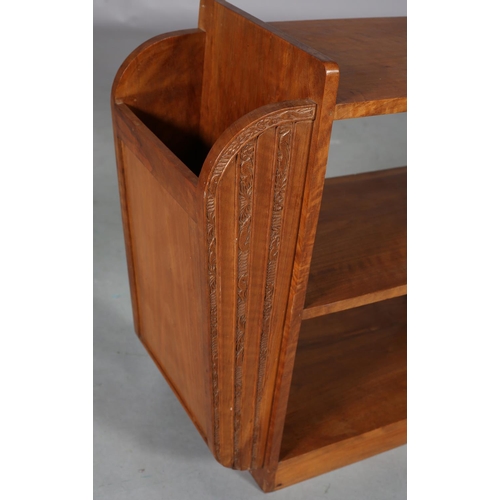 108 - An Art Deco satin walnut and walnut open bookstand with side magazine racks, carved vertical bands o... 