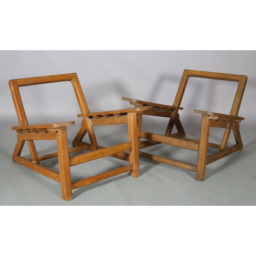 131 - A pair of elm armchair frames, c1940s, low rectangular back, broad tapered arms with finger grip, on... 