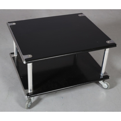 26 - A chrome and black two tier stand or table, rectangular, on castors, 60cm wide x 50cm deep x 38cm hi... 