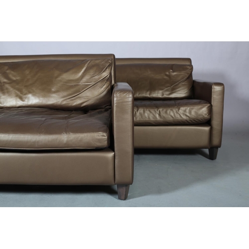 118 - A pair of Habitat brown leather 'Cuddle' chairs, 120cm wide x 86cm deep x 79cm high