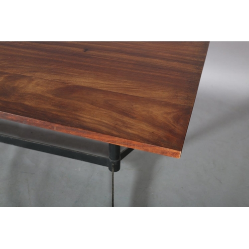 60 - An Italian walnut dining table c1960s on metal twin pedestal joined by a stretcher and on splayed fe... 