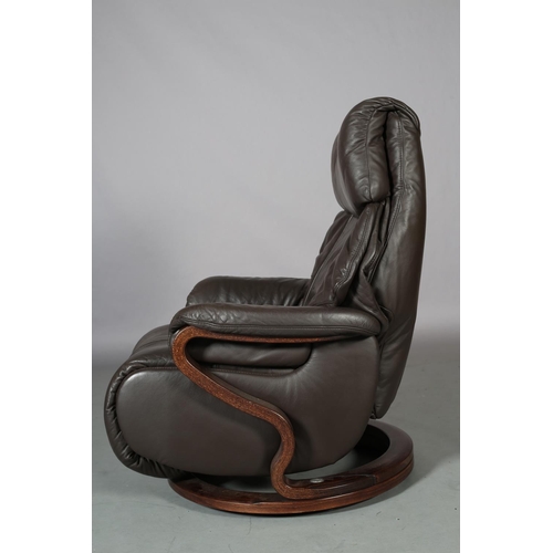 31 - A Himolla brown leather reclining swivel armchair on bentwood frame