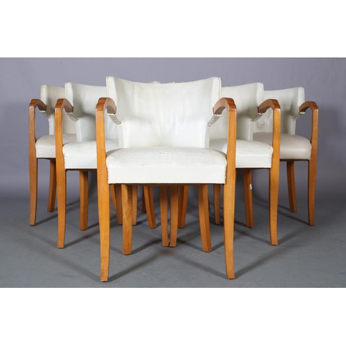 107 - A set of six Art Deco walnut and cream leather club chairs, with tub-shaped back, on square tapered ... 