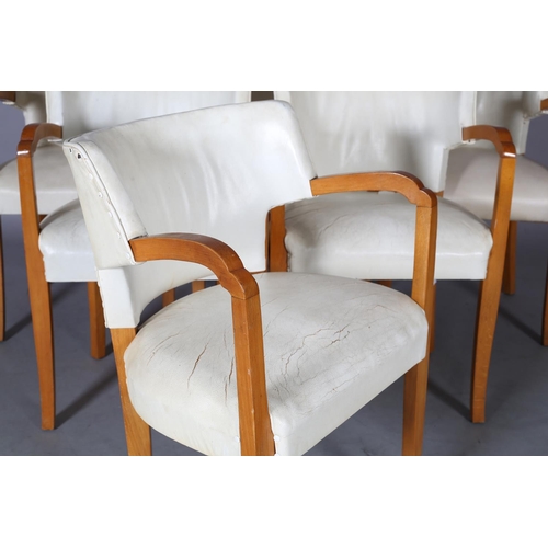 107 - A set of six Art Deco walnut and cream leather club chairs, with tub-shaped back, on square tapered ... 