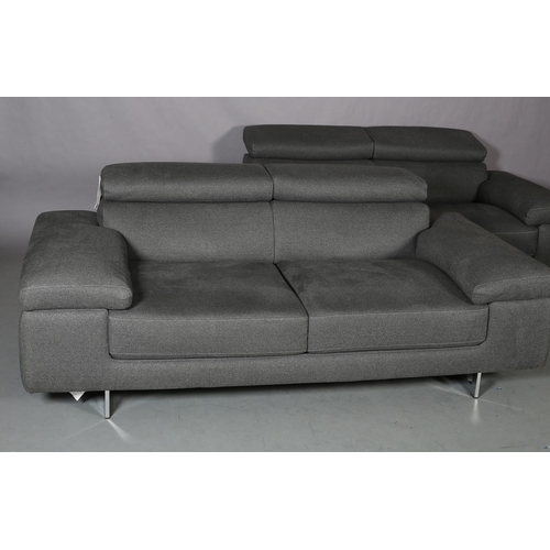 116 - Natuzzi Editions, Italy, a pair of sofas upholstered in pale grey fabric, with adjustable headrest, ... 