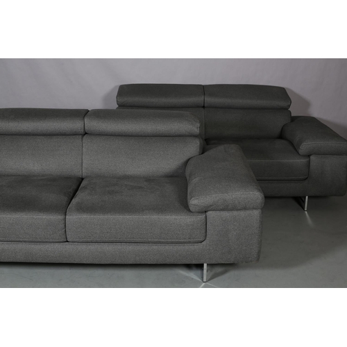 116 - Natuzzi Editions, Italy, a pair of sofas upholstered in pale grey fabric, with adjustable headrest, ... 