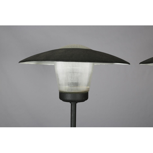 84 - A pair of French metal and holophane glass floor lamps, c1950s, 175cm