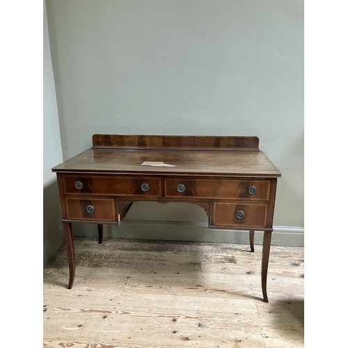 271 - An Edwardian mahogany side table with raised back having satinwood inlay above two long and two shor... 