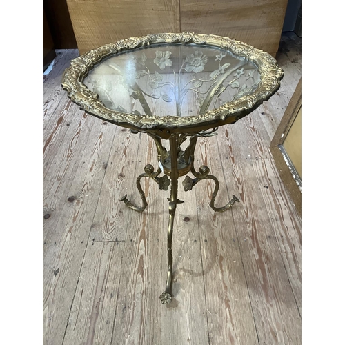 269 - A gilt metal occasional table the support formed from foliate forms with glass top 40cm wide x 52cm ... 