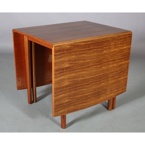 115 - Morris of Glasgow, a walnut drop leaf dining table, c1970s, on square tapered legs, 184cm x 84cm