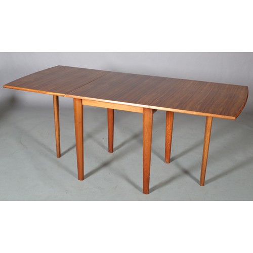 115 - Morris of Glasgow, a walnut drop leaf dining table, c1970s, on square tapered legs, 184cm x 84cm