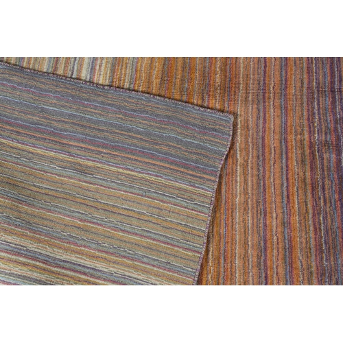 120 - Conran, A multi-coloured striped wool rug, in muted shades, 243cm x 172cm