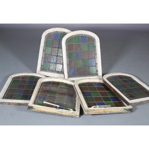 125 - A set of six colour stain glass leaded windows in arched frames, c1890, each 69cm x 52cm