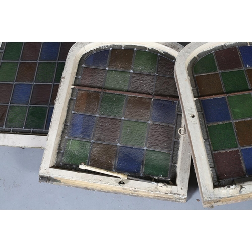 125 - A set of six colour stain glass leaded windows in arched frames, c1890, each 69cm x 52cm