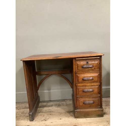 326 - Early 20th Century oak desk, knee hole flanked with a single pedestal with a pull slide and four dra... 