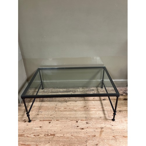 333 - A glass topped metal framed coffee table, 120cm x 80cm x 46cm