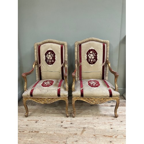 312 - A pair  of 17th Century style Italian gilt wood open armchairs with silk and velvet upholstery to th... 