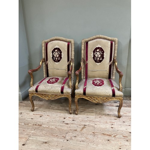 312 - A pair  of 17th Century style Italian gilt wood open armchairs with silk and velvet upholstery to th... 