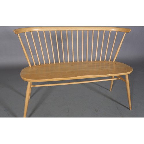 40 - An Ercol 'Originals' blonde love seat, with stick back, decal to underside, 112cm wide, 82cm high an... 