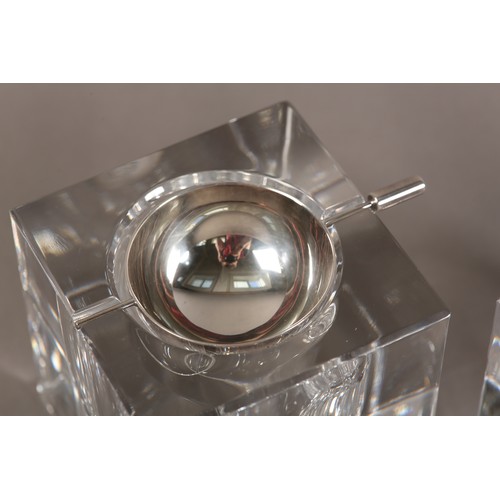 51 - Ercuis, France, A pair of clear ashtrays of cuboid form with silver plated dished liners, 9cm