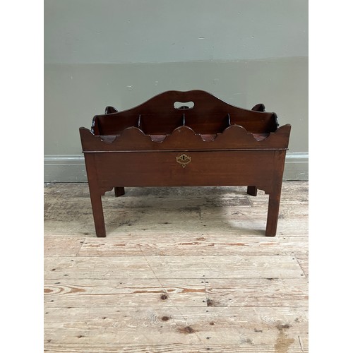 323 - A mahogany tray top box, the hinged lid having eight divisions with ogee side panels and an arched c... 