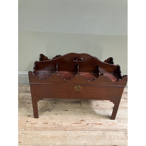 323 - A mahogany tray top box, the hinged lid having eight divisions with ogee side panels and an arched c... 