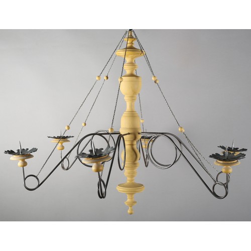 36 - A 16th century Italian design inspired ceiling light in cream wood and scrolled metal with six arms ... 