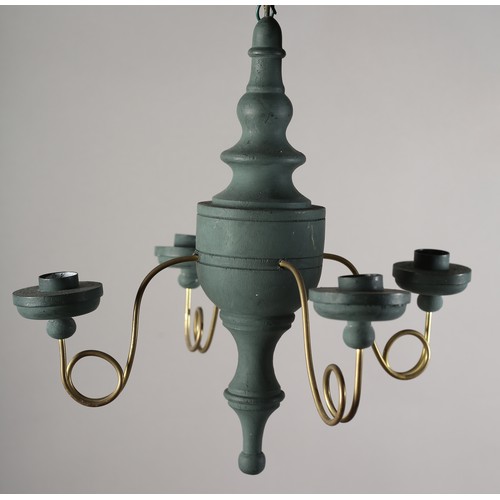 36 - A 16th century Italian design inspired ceiling light in cream wood and scrolled metal with six arms ... 